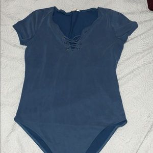 Blue cross front body suit